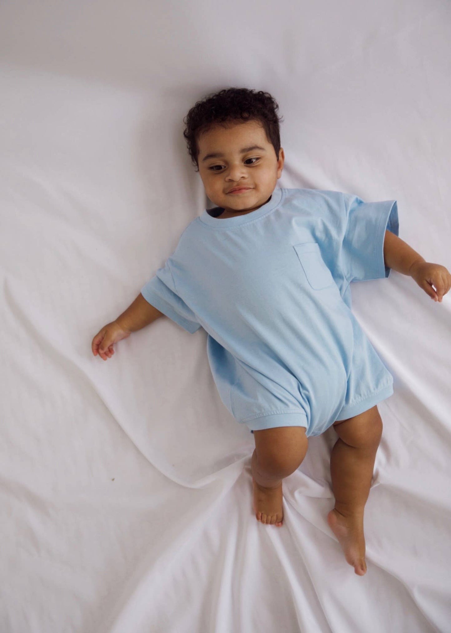 Cory Pocket Romper in Dream Blue